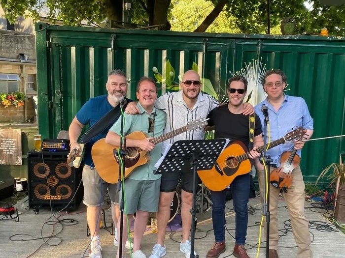 The band Strangers In Trainers