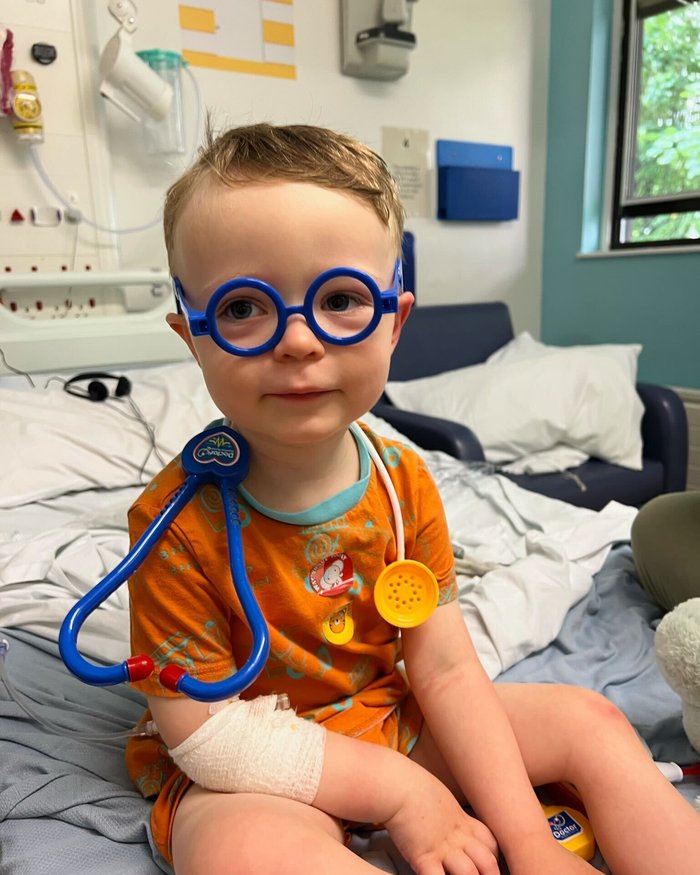 Freddie in hospital, playing with a toy doctor's kit