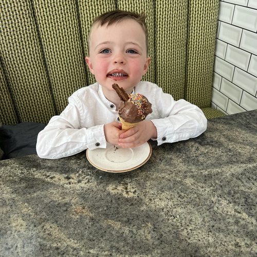 Freddie enjoying a chocolate ice cream cone